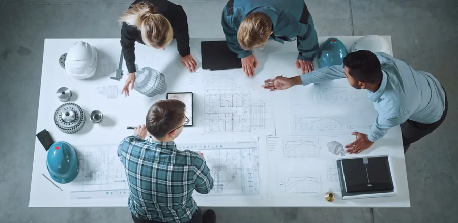 AMF MEP engineers reviewing drawings together
